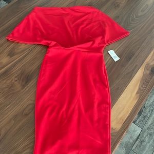 Classic red dress. Pencil skirt detail, slit in back